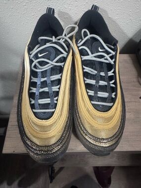 Nike Women’s Black and Gold Air Max 97’s
